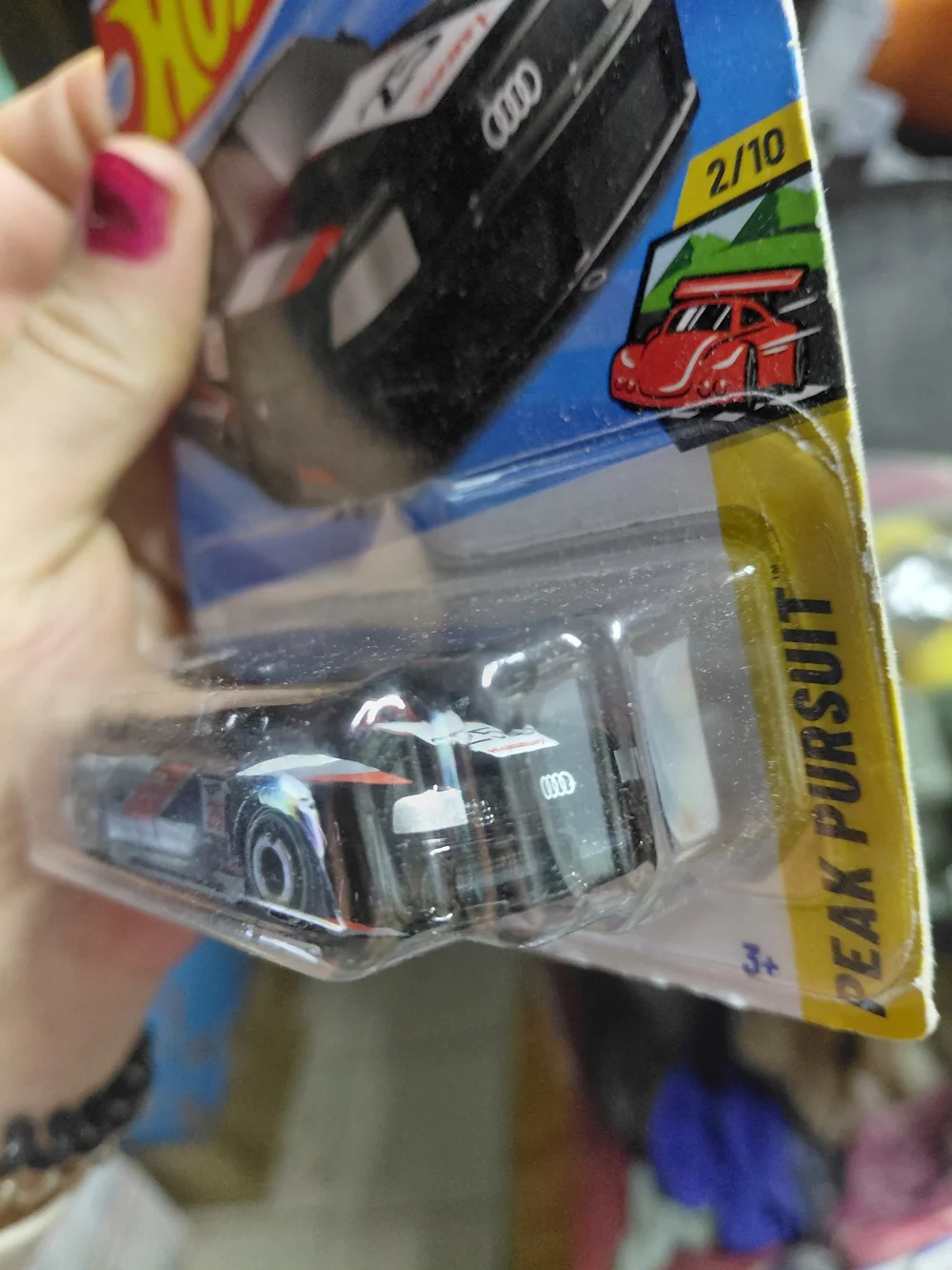 the Hot Wheels Audi 90 Quattro in black, numbered 199/250
